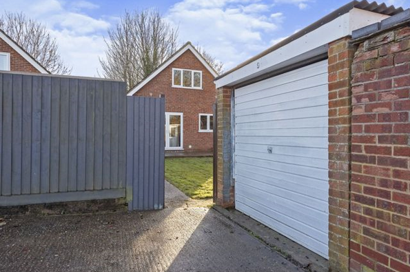 Garage and house with garden
