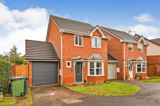 Red Brick house with garage